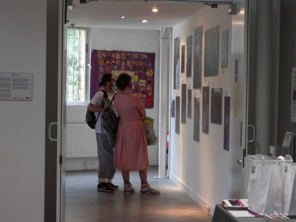 Visitors at Out On An Island first exhibition displayed at Quay Arts in Newport for a month in the Summer of 2021.